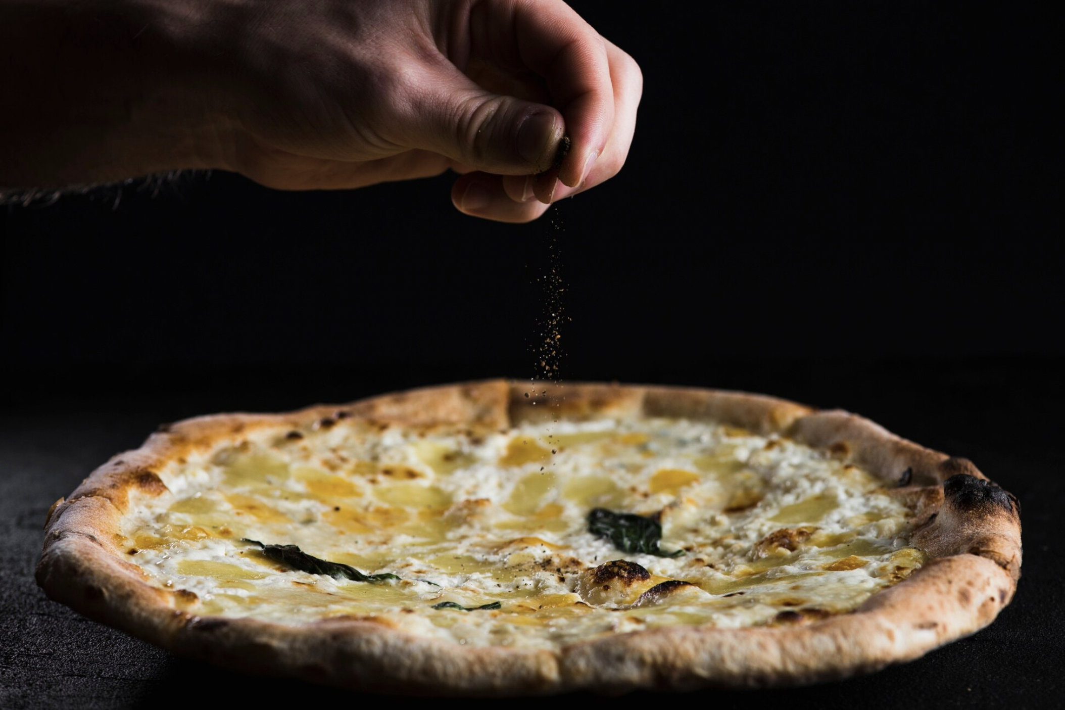 Assaisonnement sur pizza